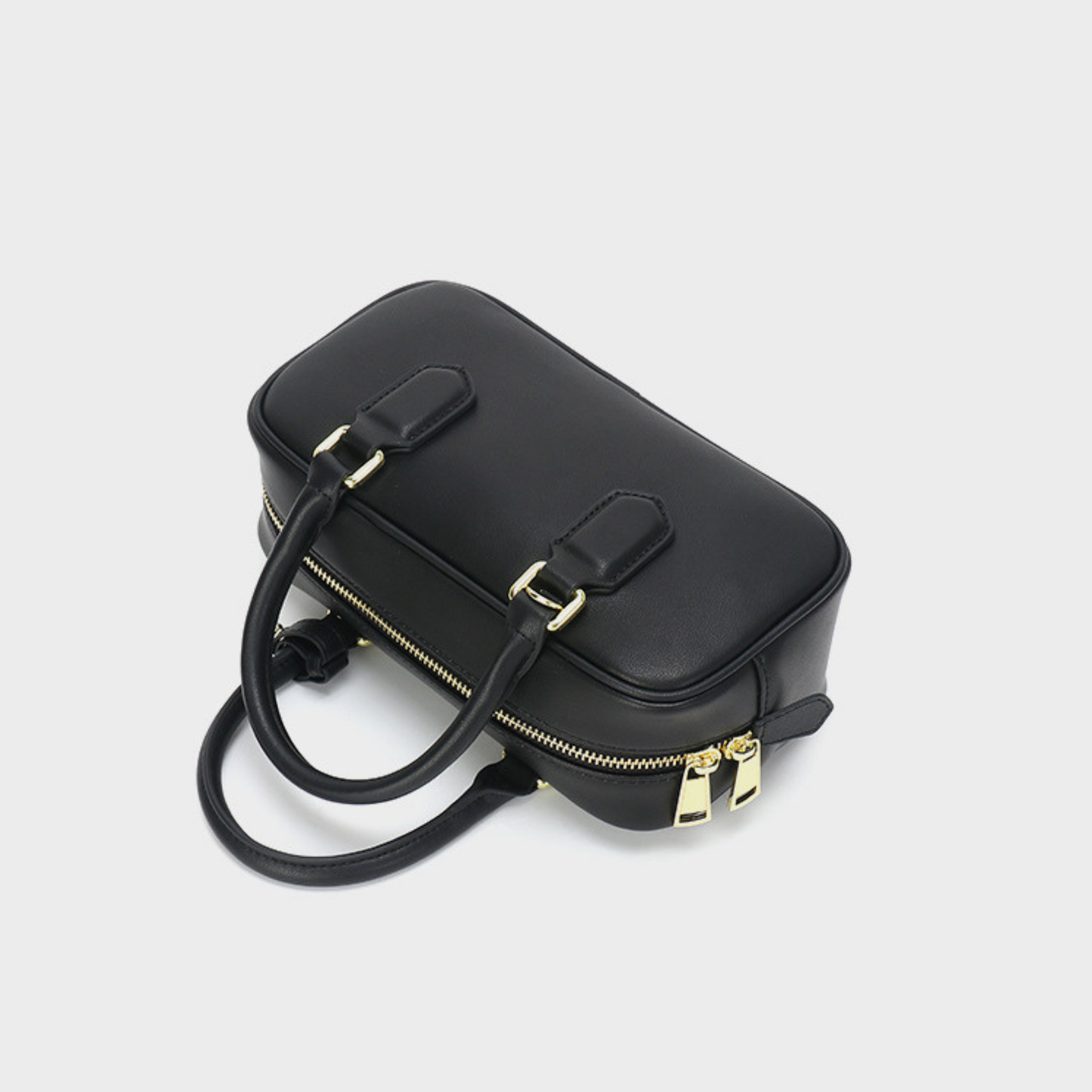 Compact Boxy Leather Bowling Top‑Handle Bag