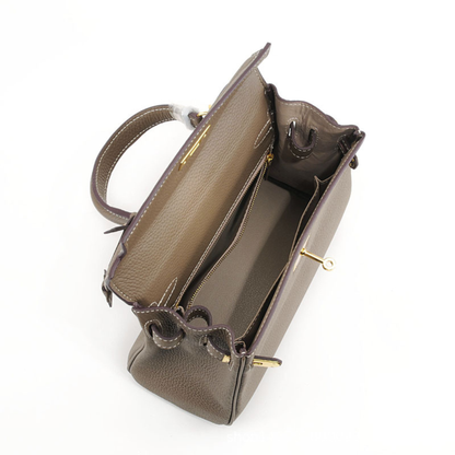 Retourne-Inspired Handcrafted Relaxed leather handbag